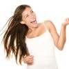 How to Feel Good With Arthritis Woman listening dancing to music