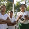 Discover the Heart of Myanmar by Bike School girls playing soccer in Burma