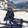 Mountain Biking in the Alps Mountain Biker fallen off in the snow