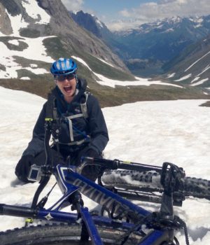 Mountain Biking in the Alps Mountain Biker fallen off in the snow