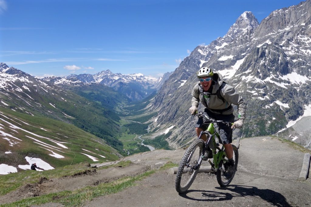 Excited mountain biker in the Alps