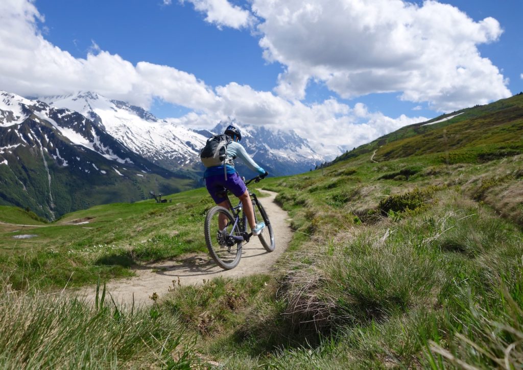 Mountain Biker Riding single trails Alps